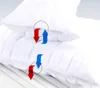 Two white pillows are stacked on top of each other, with arrows indicating airflow between them. Produktbild-Vorschau