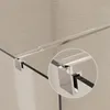 Close-up view of a shower screen stabilizer bar and its connection to the glass. Produktbild-Vorschau