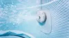 Close-up underwater view of a jet in a hot tub, with water spraying out. Náhled obrázku produktu