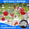 A collection of Japanese wind chimes hanging outdoors, with a close-up inset of small metal parts. Produktbild-Vorschau