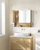 A modern bathroom vanity with a sink and a mirrored cabinet above. Náhled obrázku produktu