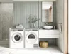 A modern laundry room with a washing machine and dryer, a sink, and a mirror. Produktbild-Vorschau