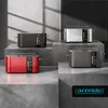 Four toasters of different colors are displayed on concrete blocks in a studio setting with dramatic lighting. Náhľad obrázku produktu