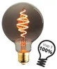 A close-up studio shot of a decorative LED light bulb with a spiral filament, placed on a white background. A graphic overlay with text is present in the lower right corner. Produktbild-Vorschau