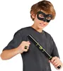 A young boy wearing a black mask and a grey t-shirt, holding a black toy staff with green accents and a ring on his finger. Anteprima dell’immagine prodotto