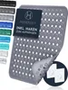 A grey Homerella brand shower mat is shown diagonally with a label indicating it includes hooks for hanging. Produktbild-Vorschau