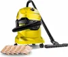 A yellow vacuum cleaner with a black hose and wand, along with a stack of brown filter bags, is displayed against a white background. Produktbild-Vorschau