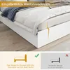 Close-up of a white bed frame with a mattress, showing a comparison between a snap-in design and a normal design. Produktbild-Vorschau
