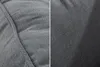 Close-up view of gray fabric texture with stitching details. Produktbild-Vorschau