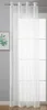A sheer white curtain hangs in front of a window with a grid pattern. A framed picture with green foliage is visible on the left. Produktbild-Vorschau