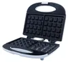 An open waffle maker on a white background. Anteprima dell’immagine prodotto