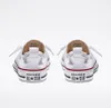 A pair of white Converse Chuck Taylor Shoreline Slip sneakers shown from the back. Produktbild-Vorschau