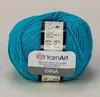 A ball of turquoise yarn with a label. Produktbild-Vorschau
