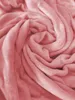 A close-up, swirling texture of a pink blanket. Produktbild-Vorschau