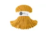 A spool of mustard-colored yarn is shown against a white background. Podgląd zdjęcia produktu