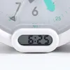 Close-up of a digital clock face with analog hands. Produktbild-Vorschau