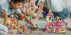 Children playing with magnetic building blocks on the floor. Náhled obrázku produktu