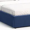A close-up view of a blue upholstered bed frame with white bedding. Produktbild-Vorschau