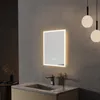 A modern bathroom vanity with a sink, faucet, and a lit LED mirror above it. Two pendant lights hang in the background. Náhled obrázku produktu