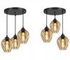 Two identical pendant light fixtures, each with three amber glass shades, are displayed against a white background. Produktbild-Vorschau