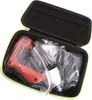 A red lock pick gun and accessories are neatly organized inside a black and lime green carrying case. Produktbild-Vorschau