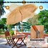 A patio set with a beach umbrella in a tropical outdoor setting. Náhled obrázku produktu