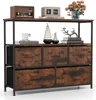 A storage cabinet with drawers and shelves, decorated with various items. Anteprima dell’immagine prodotto