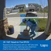 A person is delivering a package to a house. Produktbild-Vorschau