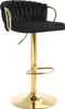 A black velvet bar stool with gold metal accents is shown against a white background.