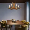 A dining room with a table and chairs, illuminated by a chandelier. Náhled obrázku produktu