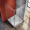A modern corner shower enclosure with glass doors and silver frames, set against a red and gray tiled wall, with a wooden floor. Voir les images du produit