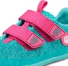A close-up view of a child's shoe, focusing on the straps and decorative owl emblem. Produktbild-Vorschau