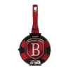 A red and black frying pan with a branded tag attached to the handle. Náhled obrázku produktu