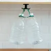 Two large plastic water bottles hanging from a rack under a shelf. Produktbild-Vorschau