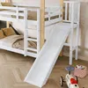 A white bunk bed with a slide and ladder, set up in a child's room with toys on the floor. Náhľad obrázku produktu