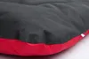 A close-up view of a dog bed with black and red fabric. Podgląd zdjęcia produktu