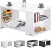 A white coffee table with storage shelves, featuring books and a wooden toy train. Several other color options for the table are shown below. Produktbild-Vorschau