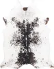 A cowhide rug is shown from a top-down perspective on a white background. Voir les images du produit