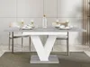 A dining table set up for a meal in a modern dining room. Anteprima dell’immagine prodotto
