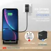 A smartphone is shown charging wirelessly on a stand, with a wall adapter and a plug adapter displayed next to it. Produktbild-Vorschau