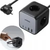 A Ugreen power strip cube with multiple outlets and USB ports, shown with its power plug and a close-up inset demonstrating its compact size. Produktbild-Vorschau