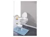 A white toilet with an open lid and an integrated child seat, mounted on a gray wall. A small white stool and a blue bath mat are placed in front of the toilet. Produktbild-Vorschau