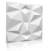 A white 3D geometric wall panel is shown against a white background with a reflection. Produktbild-Vorschau
