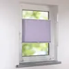 A pleated blind is installed on a window, with greenery visible outside. Produktbild-Vorschau