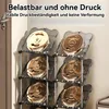 A storage rack filled with gold weight plates. Produktbild-Vorschau