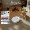 A robot vacuum cleaner is cleaning a carpet with a cat walking nearby. There are inset images showing the vacuum's brush features. Produktbild-Vorschau