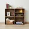 Four wooden crates stacked in a 2x2 grid, styled with decorative items. Náhled obrázku produktu