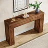 A wooden console table with decorative items on top, placed against a wall with a mirror above it. Anteprima dell’immagine prodotto