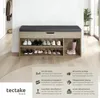 A shoe bench with storage and a cushioned top, placed in a hallway or entryway. Náhled obrázku produktu