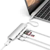 A silver USB-C hub is connected to a laptop, with multiple cables and memory cards shown. Voir les images du produit